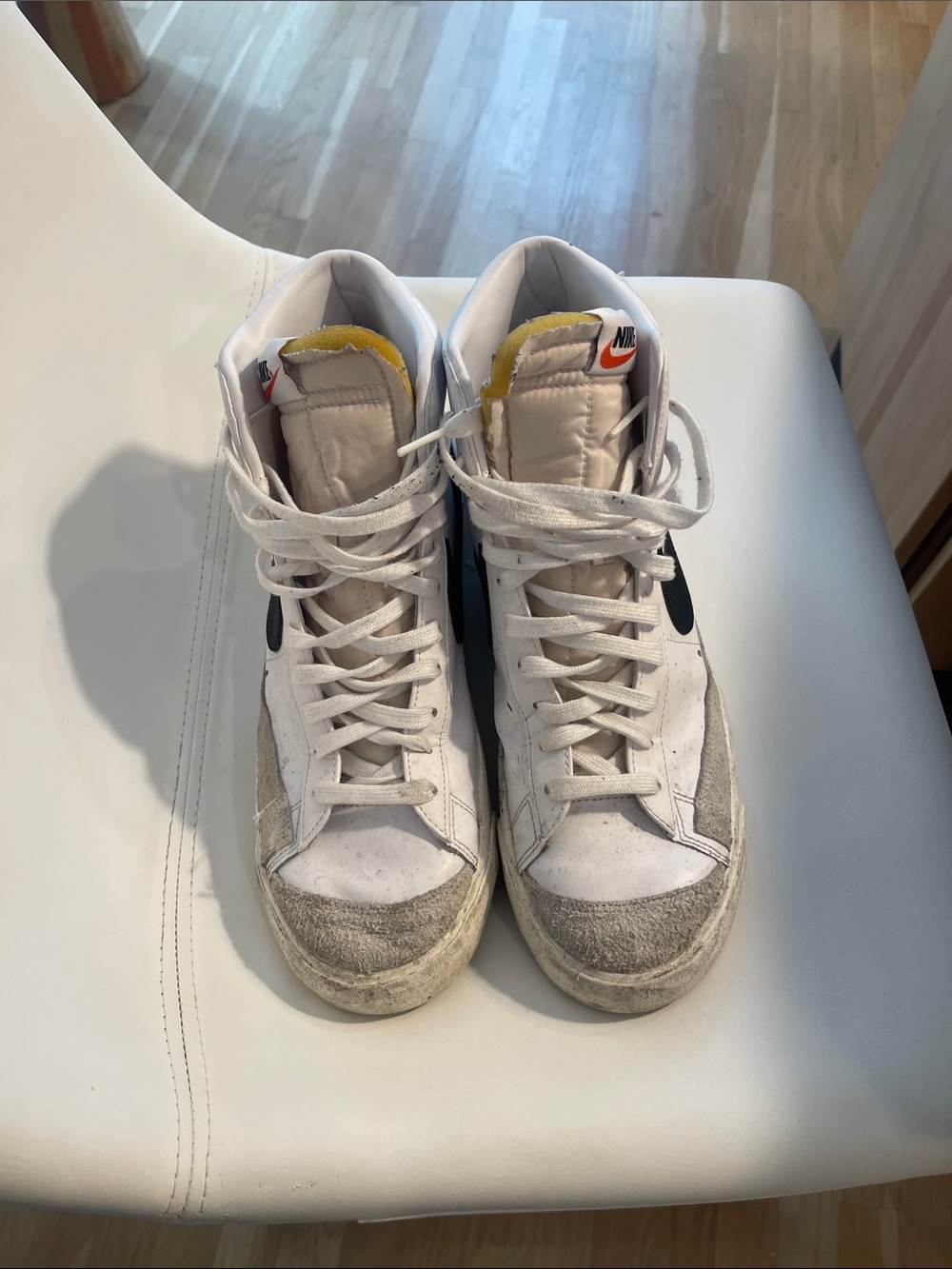 Nike White and Black High-Top Sneakers with Yellow Tongue Accent